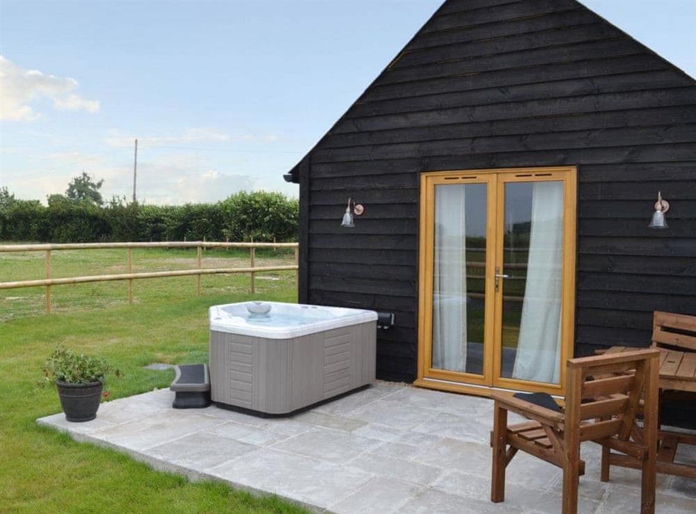 Sit out on the secluded patio at Saddlers Cottage, 