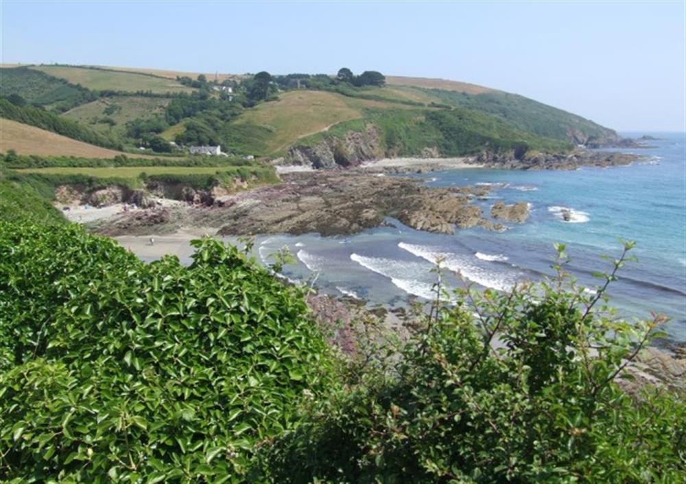 Talland Bay is along the South West Coastal Path between Looe and Polperro at Old Chapel Cottage Apartment in Looe