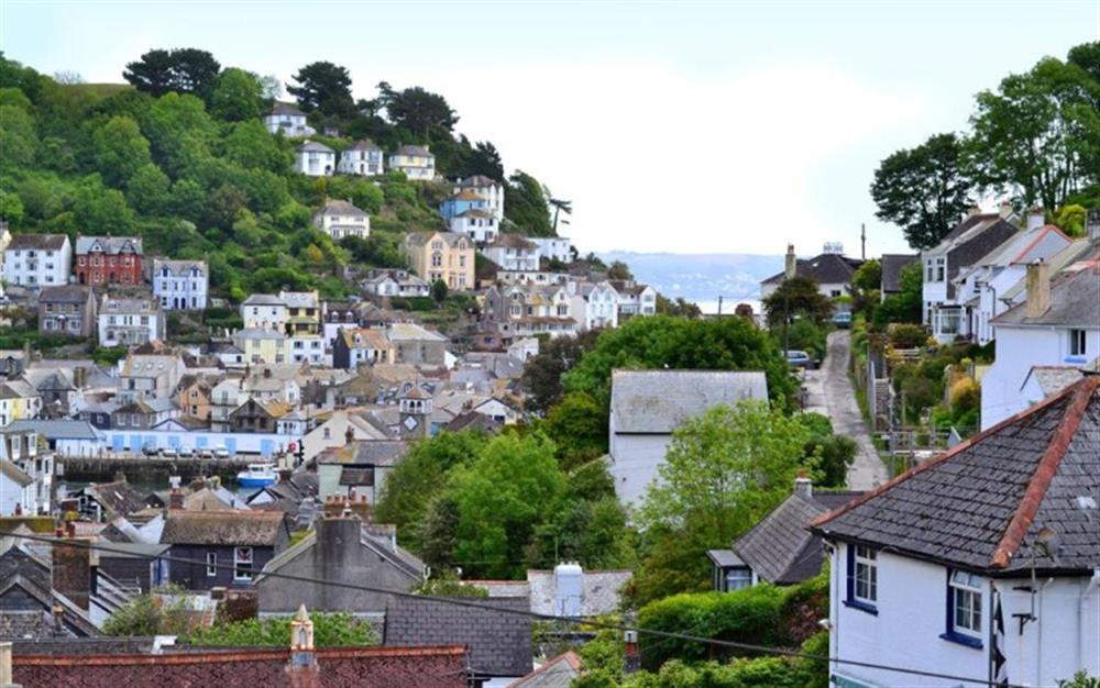 The view of the town and partial view of the harbour from the upper terrace at Old Chapel Cottage Apartment in Looe