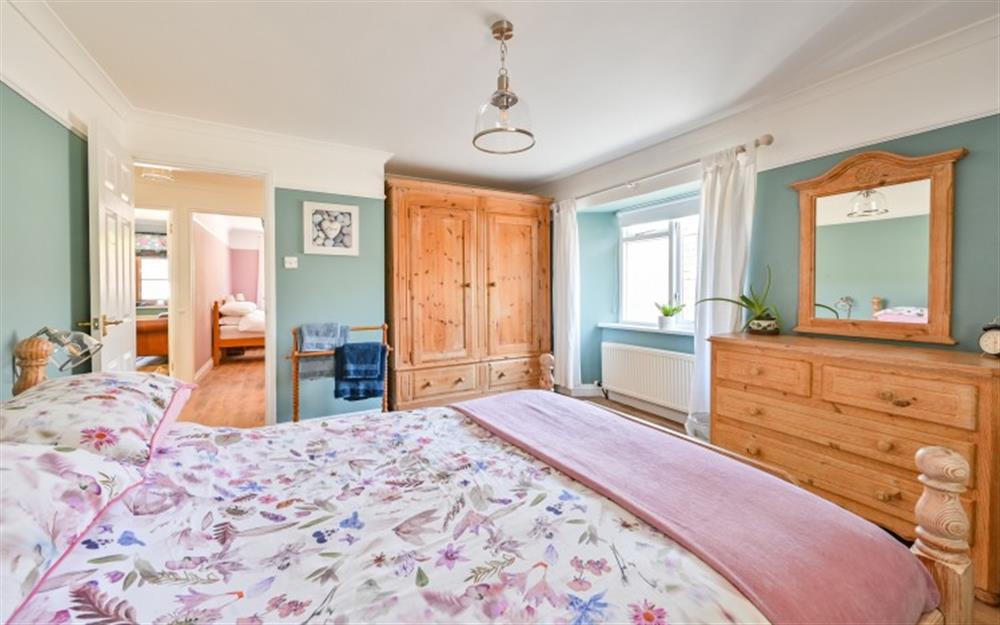 This is a bedroom at Old Chapel Cottage Apartment in Looe