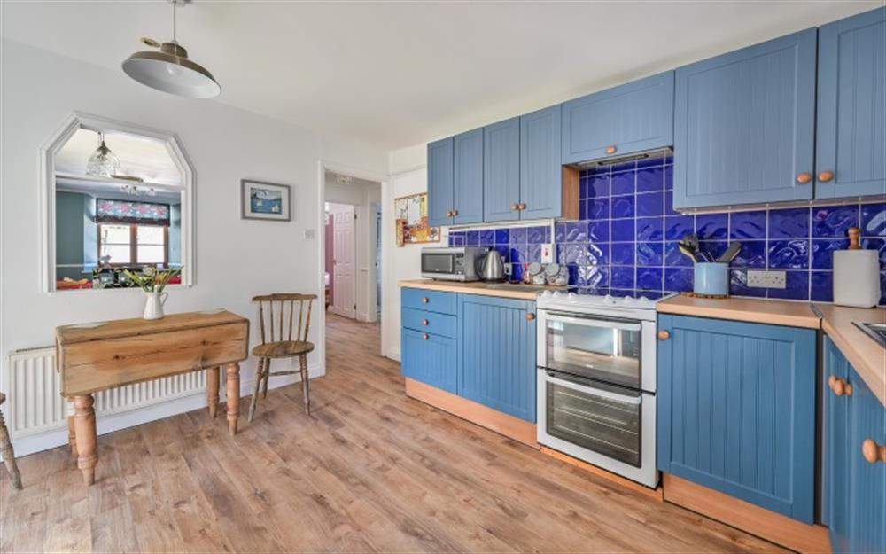 This is the kitchen at Old Chapel Cottage Apartment in Looe