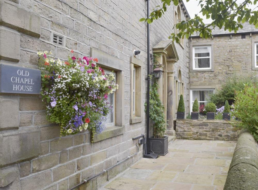 Characterful stone-paved entrance area at Old Chapel House in Barnoldswick, Lancashire