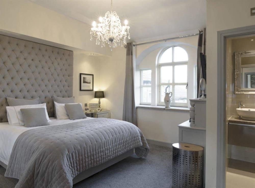 Impressive master bedroom with large en-suite shower room at Old Chapel House in Barnoldswick, Lancashire