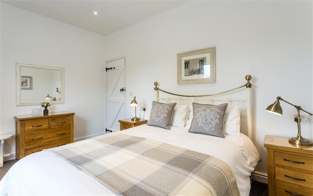 Bedroom 2 with kingsize bed at Old Cider Press in Colyton