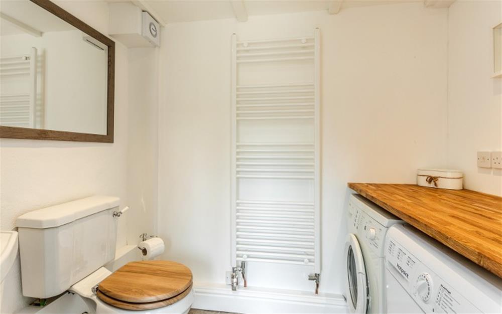 Ground floor utility room with washing machine, tumble dryer and w.c.