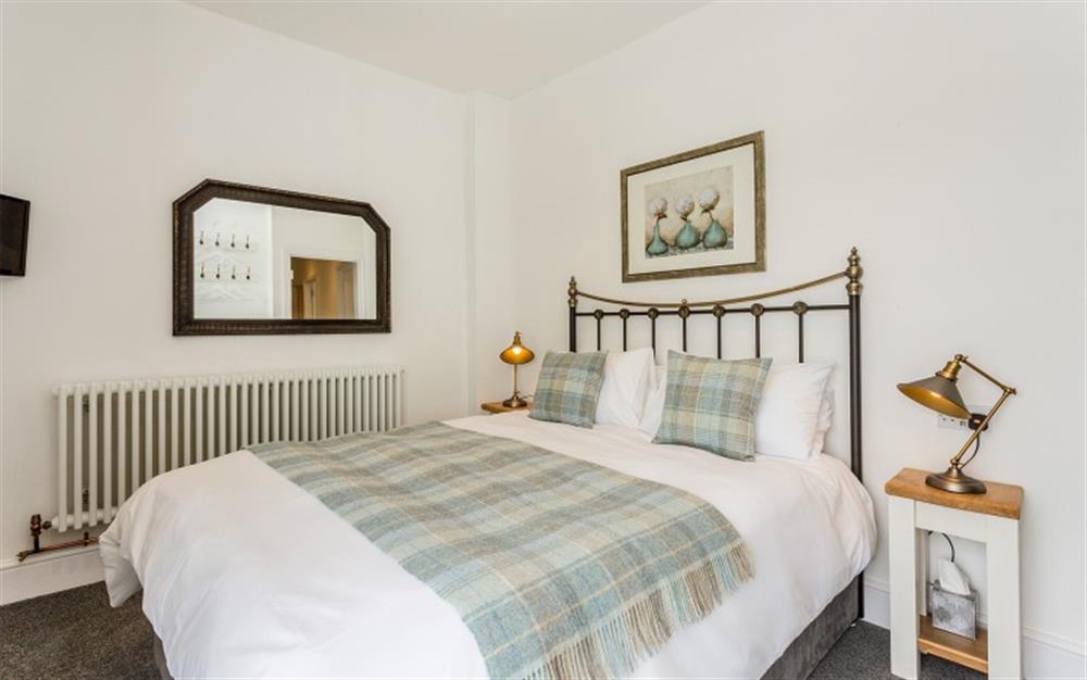 Master Bedroom with kingsize bed at Old Cider Press in Colyton