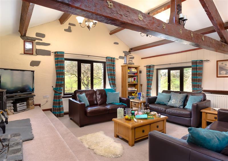 Enjoy the living room at Old Coach House, Ambleside