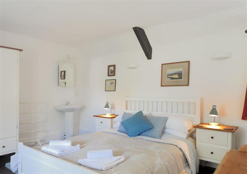 One of the 4 bedrooms at Old Cross Cottage, Charmouth