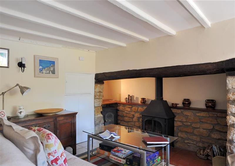 Relax in the living area at Old Cross Cottage, Charmouth