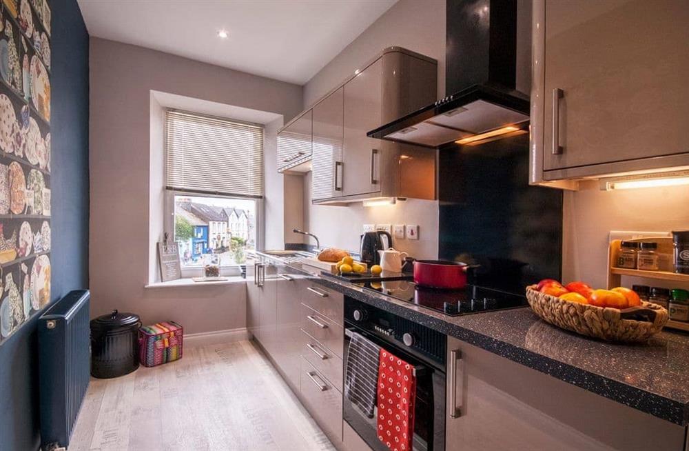 The kitchen at Old Cross Square Garden Apartment in St Davids, Pembrokeshire, Dyfed