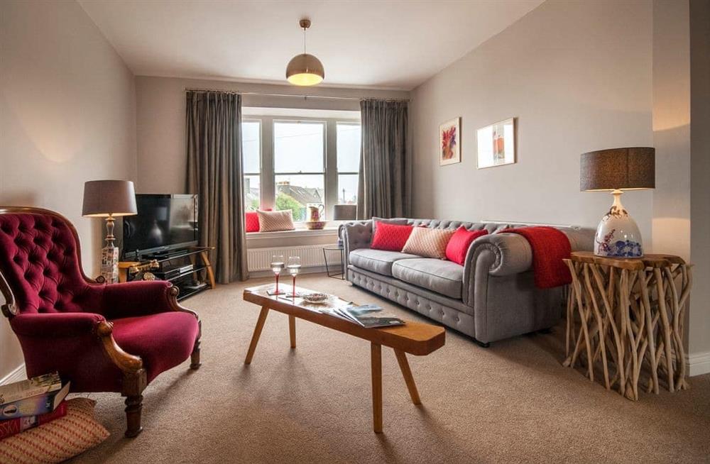 The living room at Old Cross Square Garden Apartment in St Davids, Pembrokeshire, Dyfed