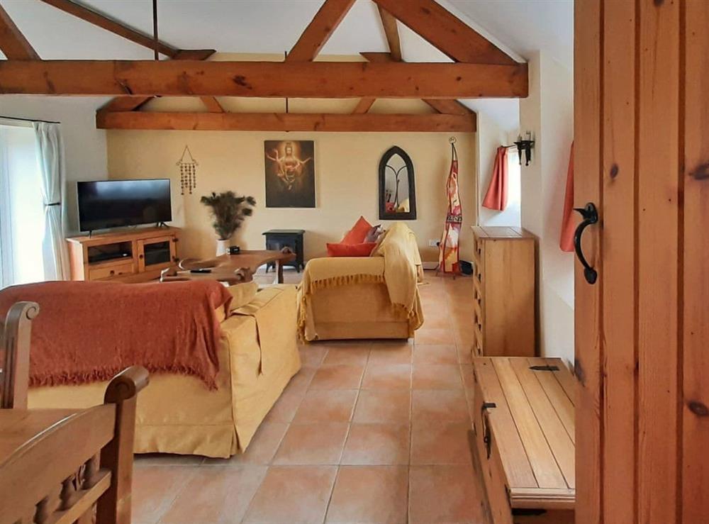 Open plan living space at Old Dairy Cottage in Salwayash, near Bridport, Dorset