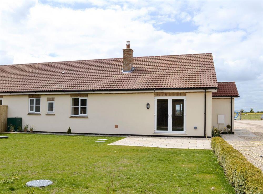 Attractive single storey holiday home with garden at Old Dairy in Faberstown, near Andover, Hampshire