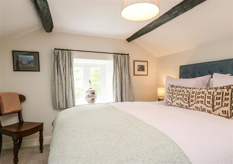 A bedroom in Old Farm Cottage at Old Farm Cottage, Skelwith Fold
