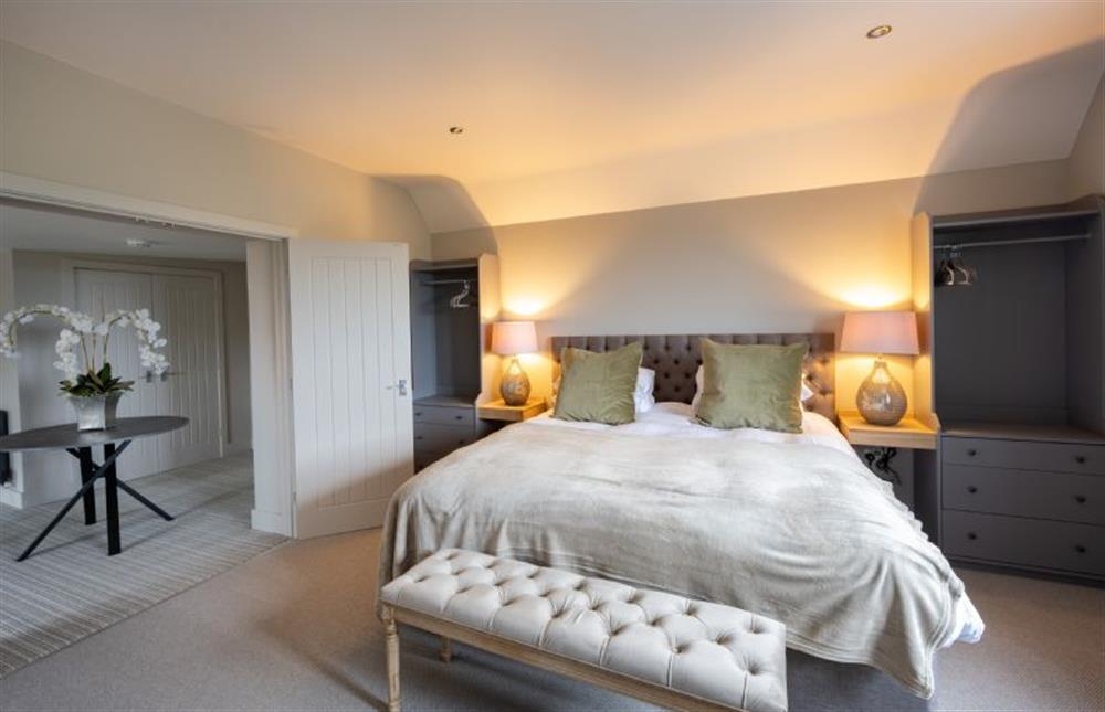 First floor: The master bedroom has views towards the sea at Old Farm, Thornham near Hunstanton