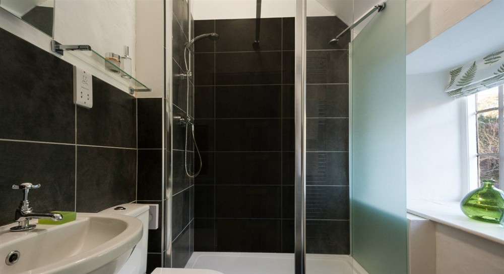 The shower room at Old Gateway Cottage in Minehead, Somerset