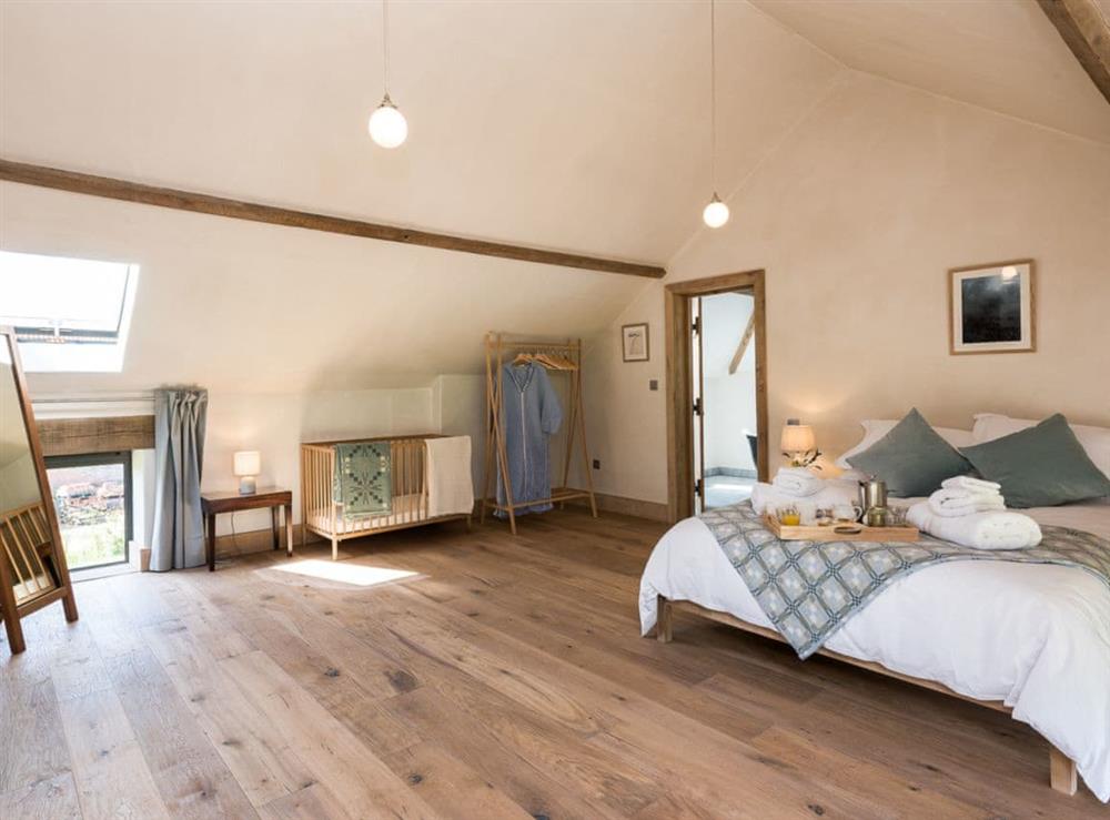 Large double bedroom with en-suite at Old Hall Farm Barn in Kerdiston, near Norwich, Norfolk