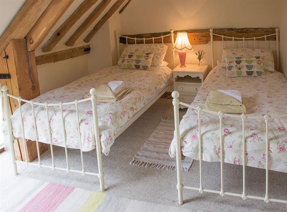 Peaceful twin bedroom at Henrys Barn, 
