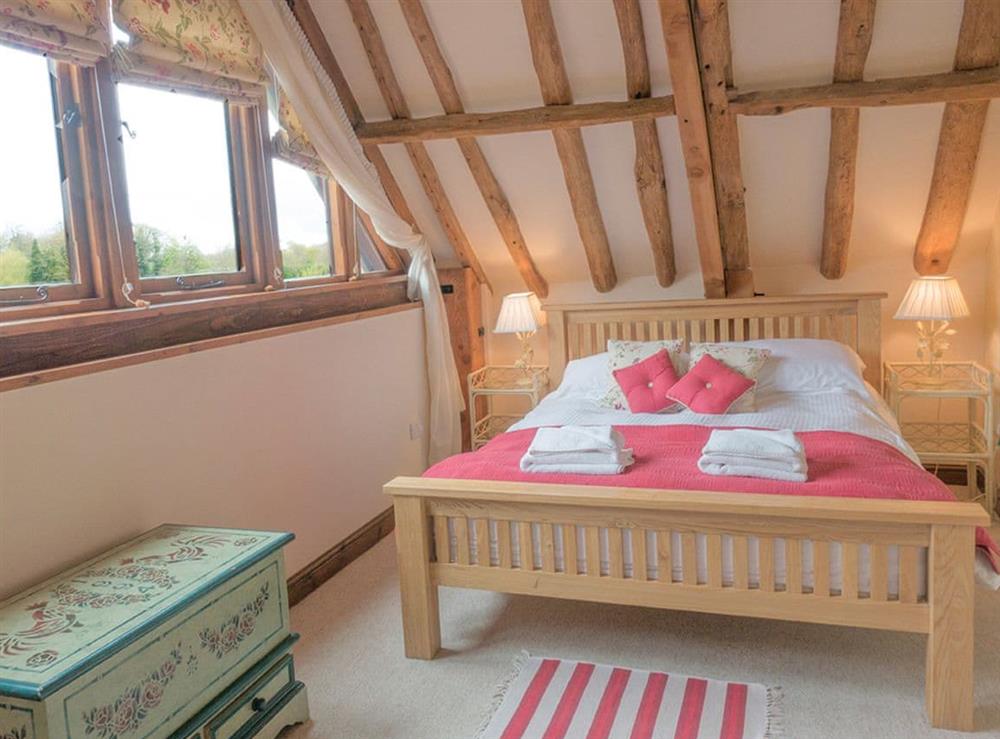 Relaxing double bedroom at Henrys Barn, 