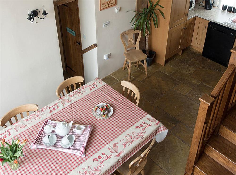 Dining area and kitchen viewed from the stairs at Old Corn Mill, 