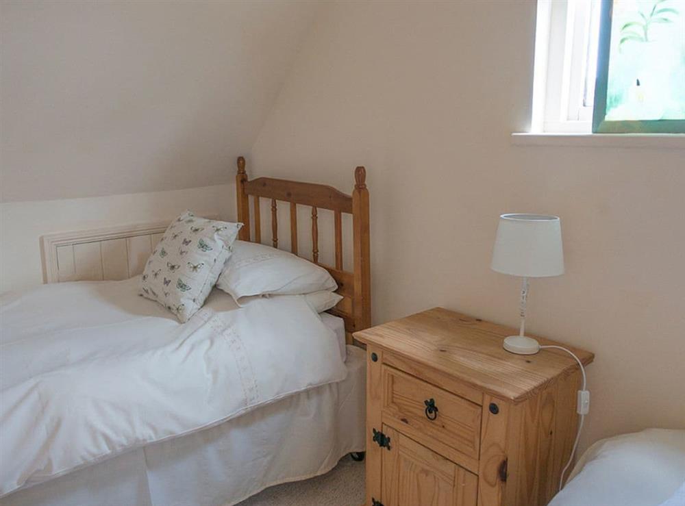 Comfortable bedroom with a single and a child’s bed at Old Dairy, 
