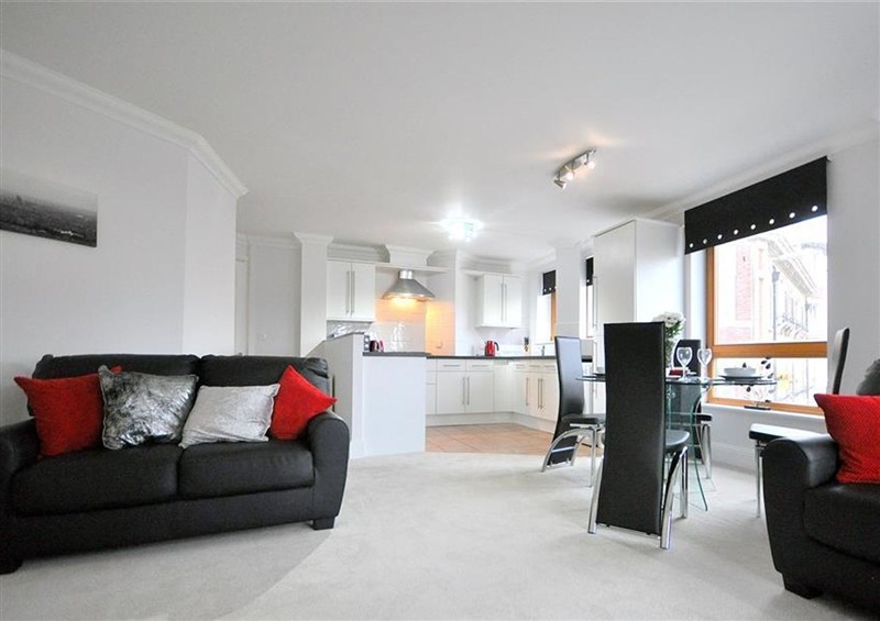 Relax in the living area at Old Harbour View, Weymouth