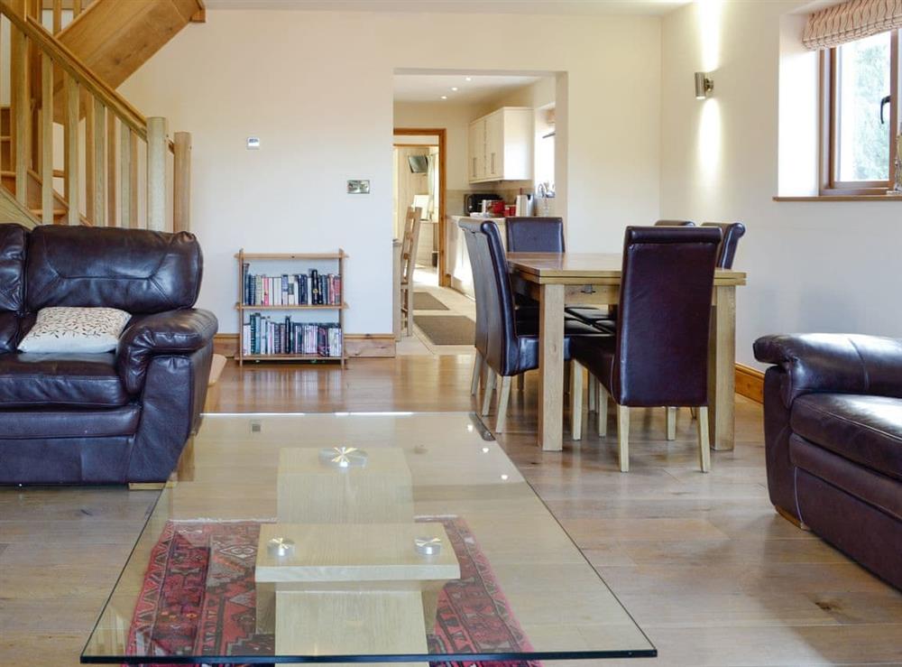 Airy living and dining area at King Offa Lodge, 
