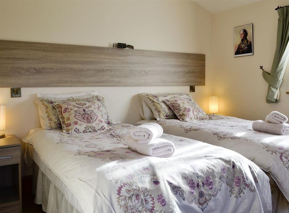 Comfortable twin bedroom at King Offa Lodge, 