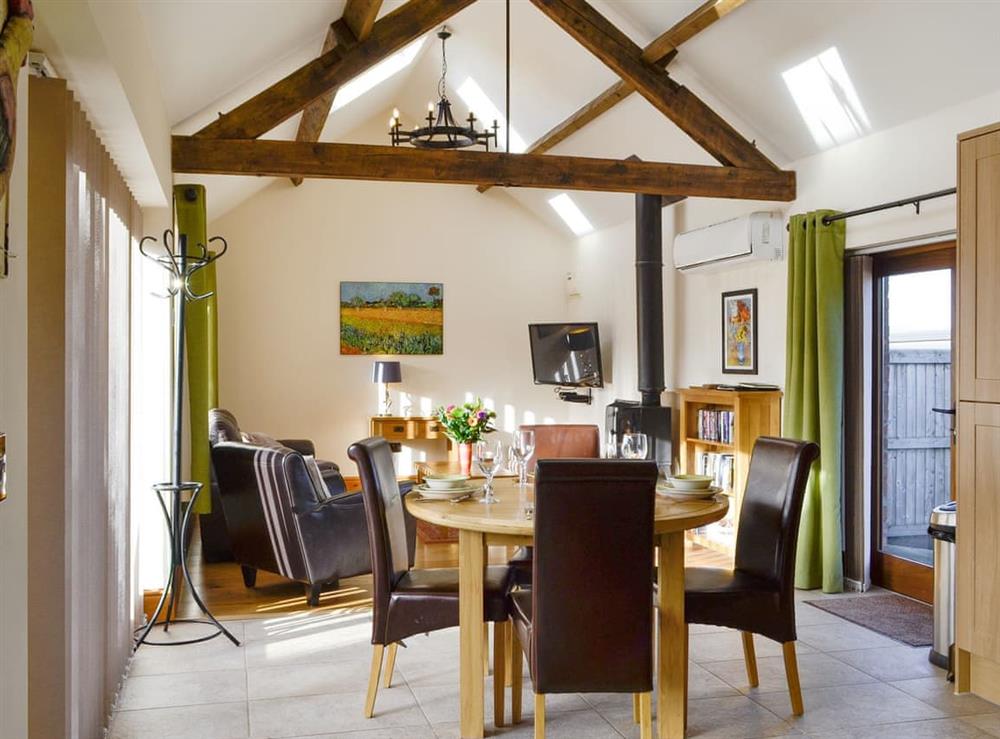 Characterful open-plan living space at Little Hendre Lodge, 
