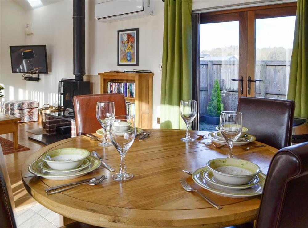 Convenient dining area at Little Hendre Lodge, 