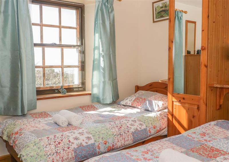 This is a bedroom (photo 2) at Old Higher Lighthouse Branscombe Lodge, Dorset