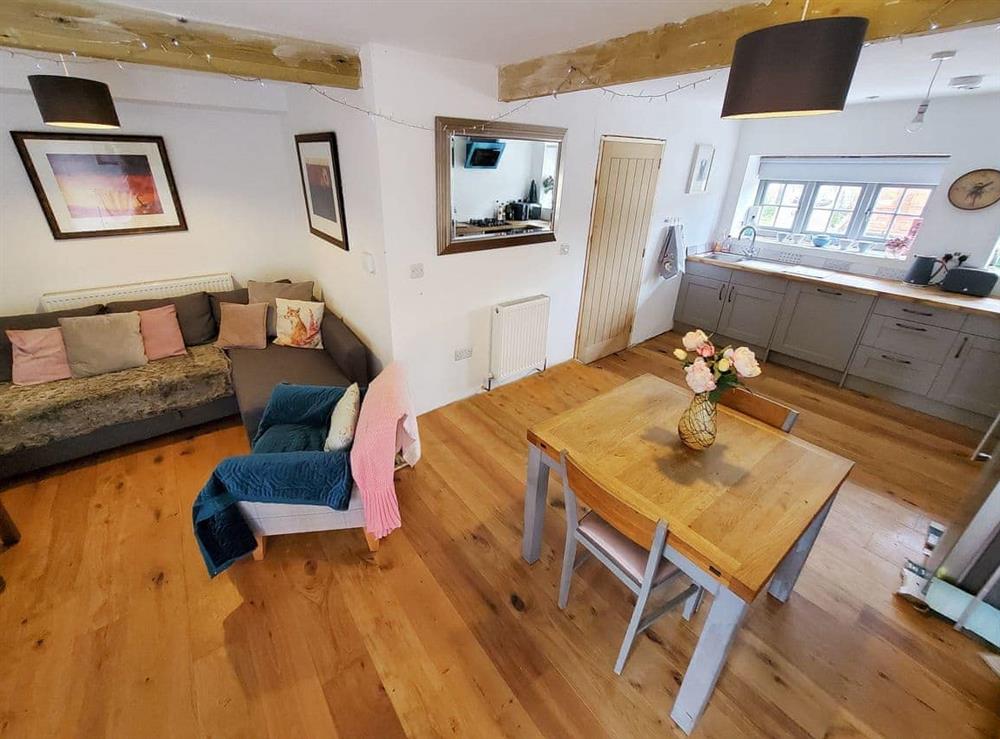 Open plan living space at Piglet Cottage, 