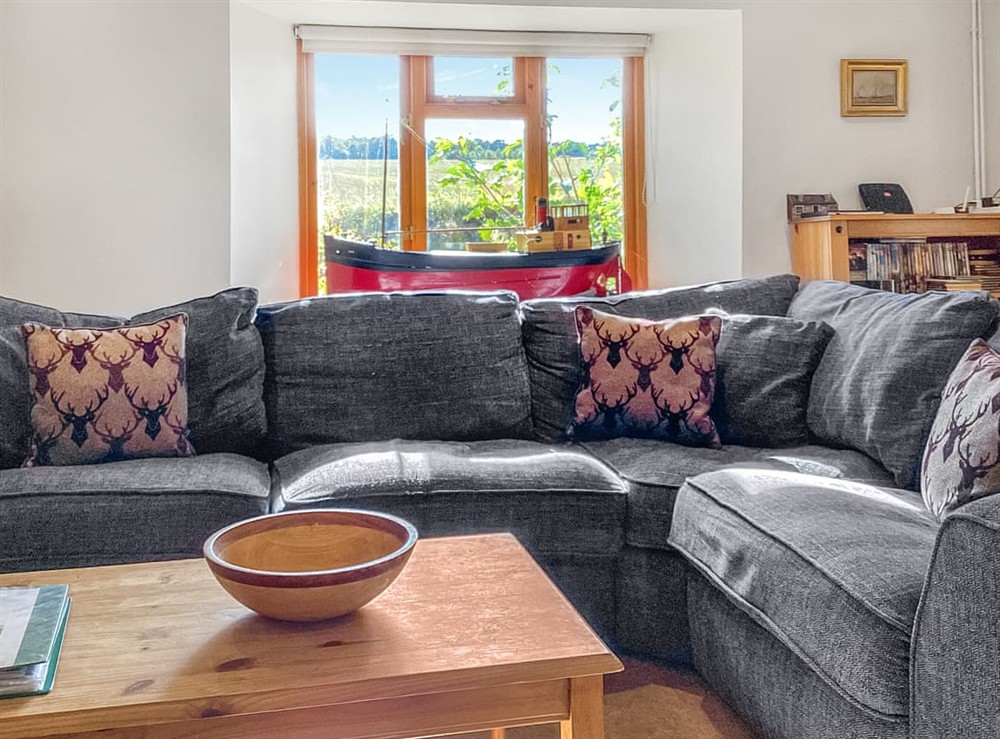 Living area at Old Laurel Cottage in Jemimaville, Ross-Shire