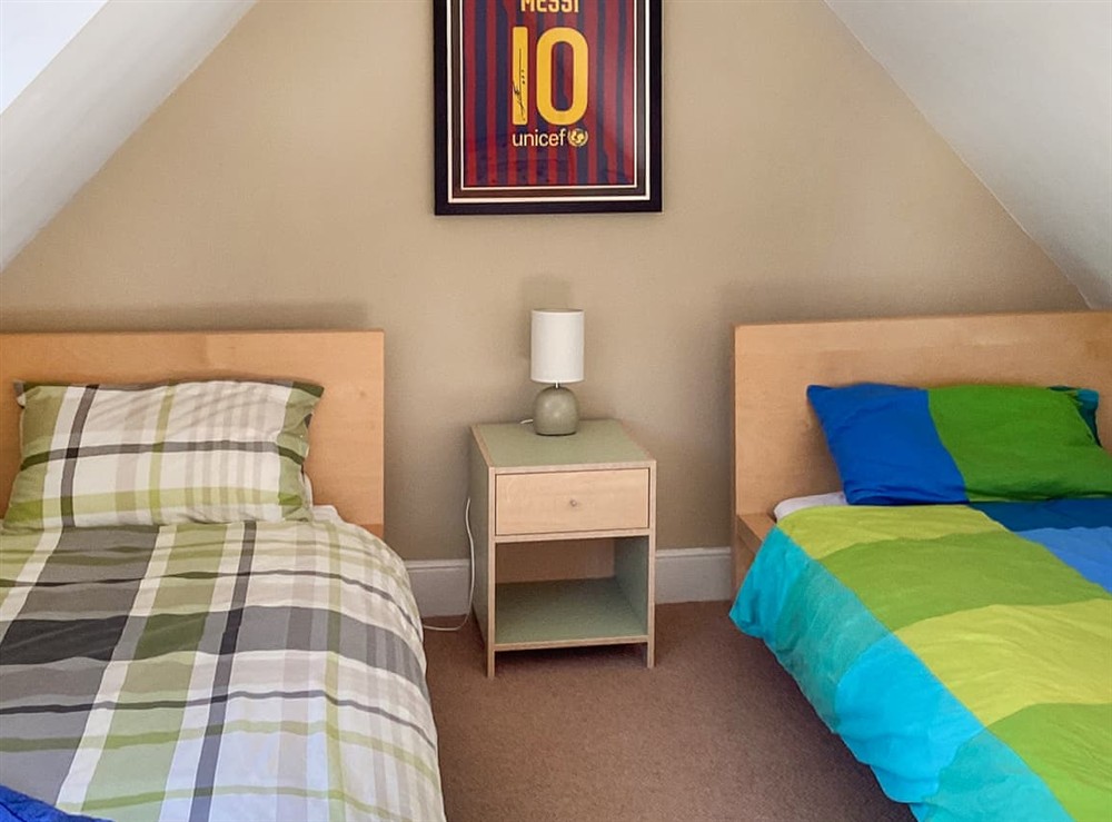 Twin bedroom at Old Laurel Cottage in Jemimaville, Ross-Shire