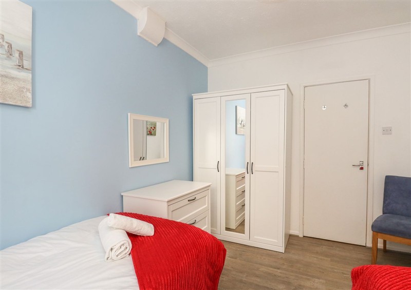 One of the bedrooms at Old Malthouse Apartment, Weymouth