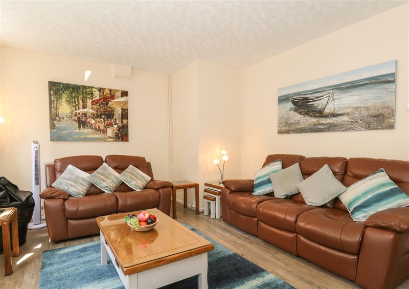 Relax in the living area at Old Malthouse Apartment, Weymouth