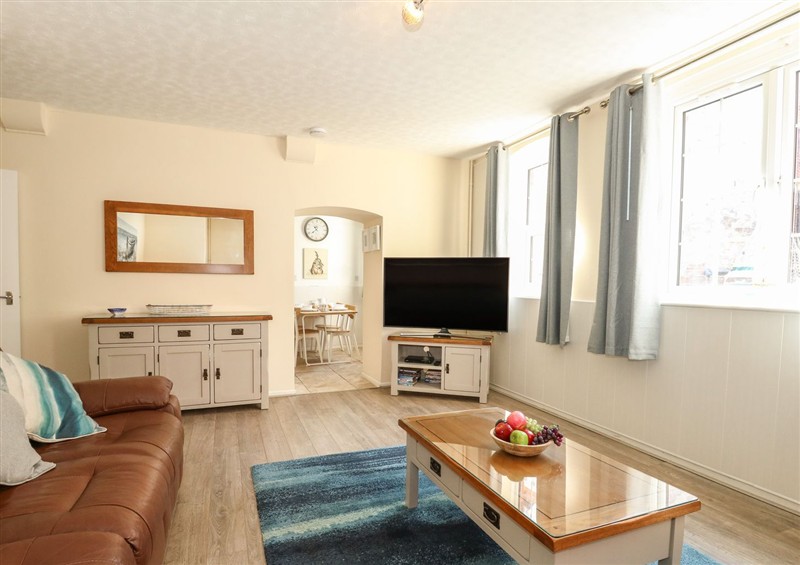 This is the living room at Old Malthouse Apartment, Weymouth