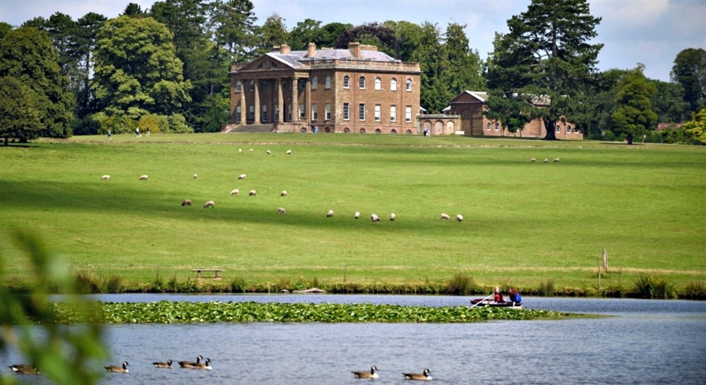 Berrington Hall from the lake on purple parkland walk at Old Mill Cottage in Bringsty, Herefordshire