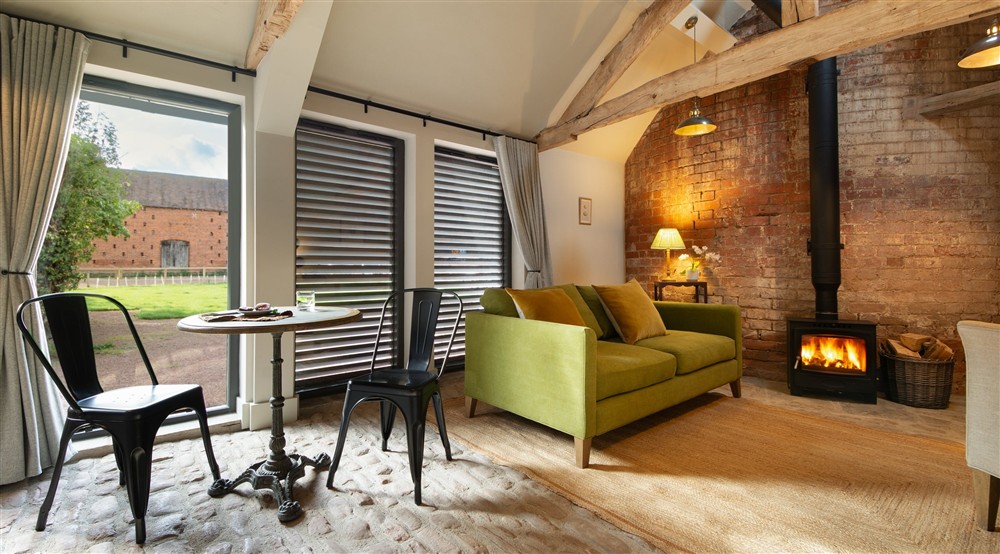 The open-plan kitchen, dining and sitting room at Old Mill Cottage in Bringsty, Herefordshire