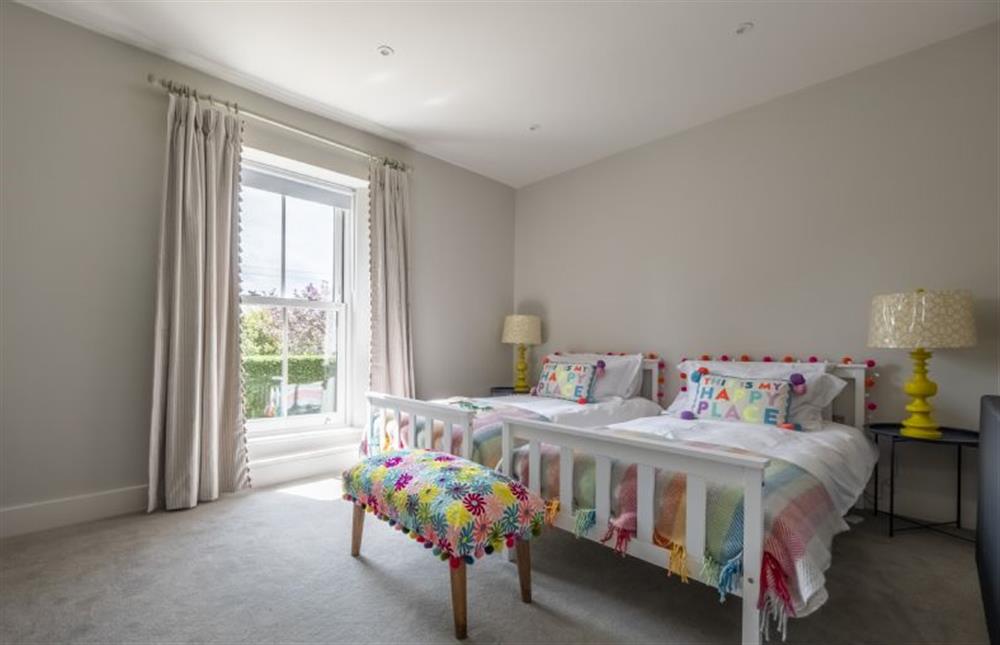 Bedroom four with twin beds at Old Mill House, Brancaster near Kings Lynn