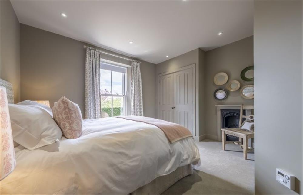 Bedroom two with 5’ king size bed at Old Mill House, Brancaster near Kings Lynn