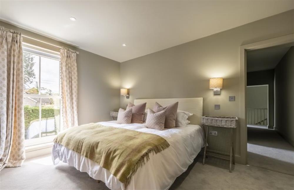 Master bedroom with 6’ super-king bed at Old Mill House, Brancaster near Kings Lynn