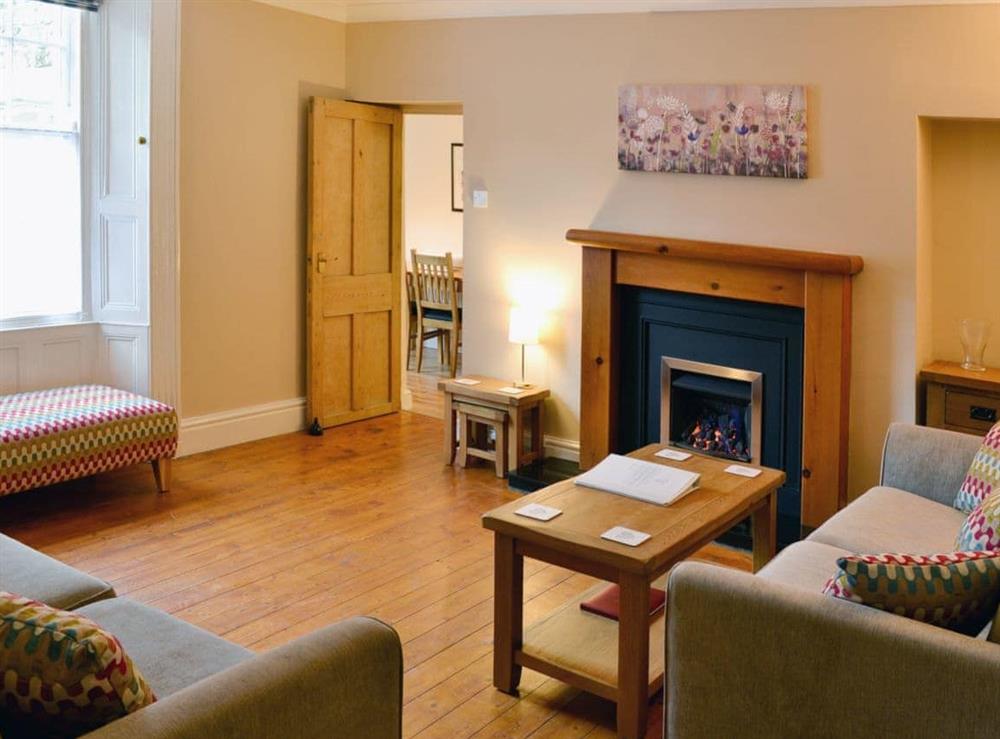 Spacious living room with coal efffect fire at Old Milverton in Grassington, North Yorkshire