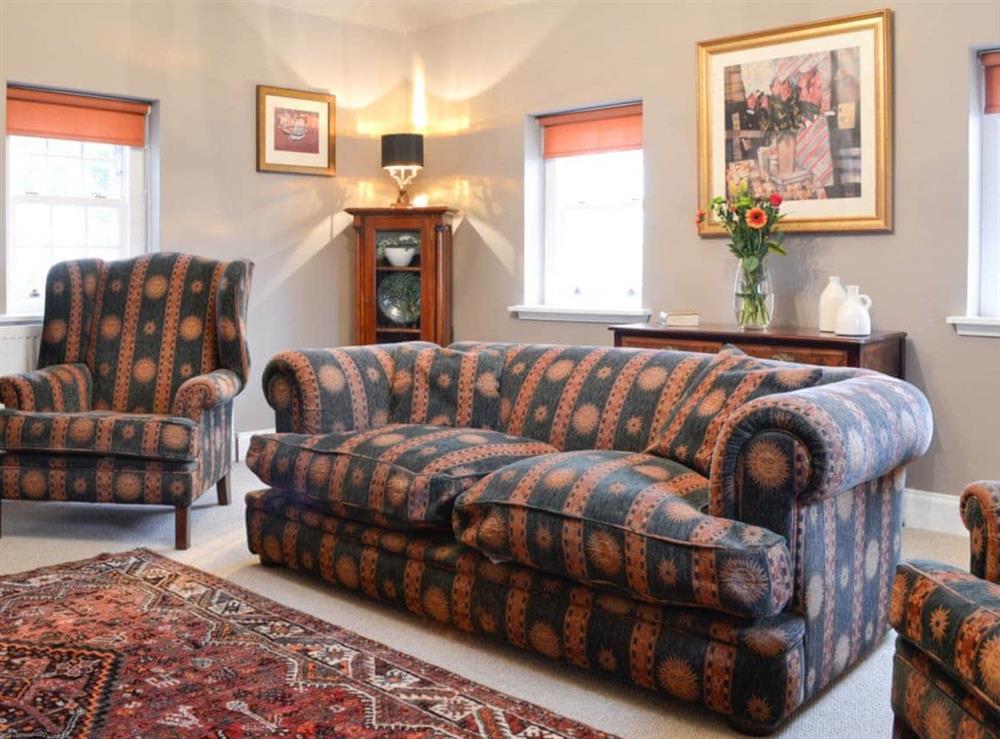 Stylish and comfortable living room (photo 3) at Gardeners Cottage, 