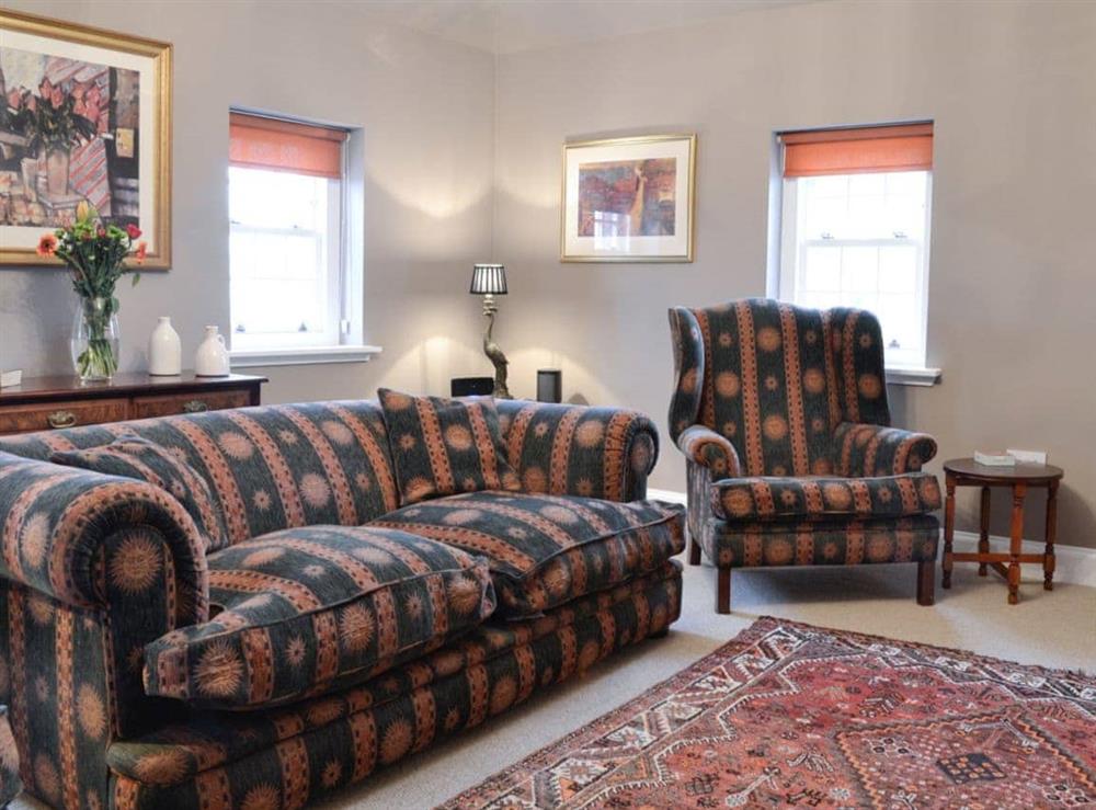 Stylish and comfortable living room at Gardeners Cottage, 