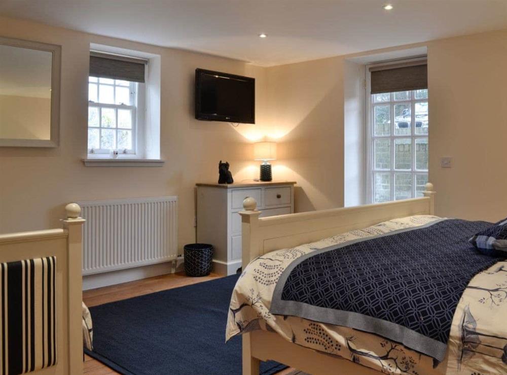 Super kingsize bed &  single bed (for flexible sleeping arrangements) at Gardeners Cottage, 