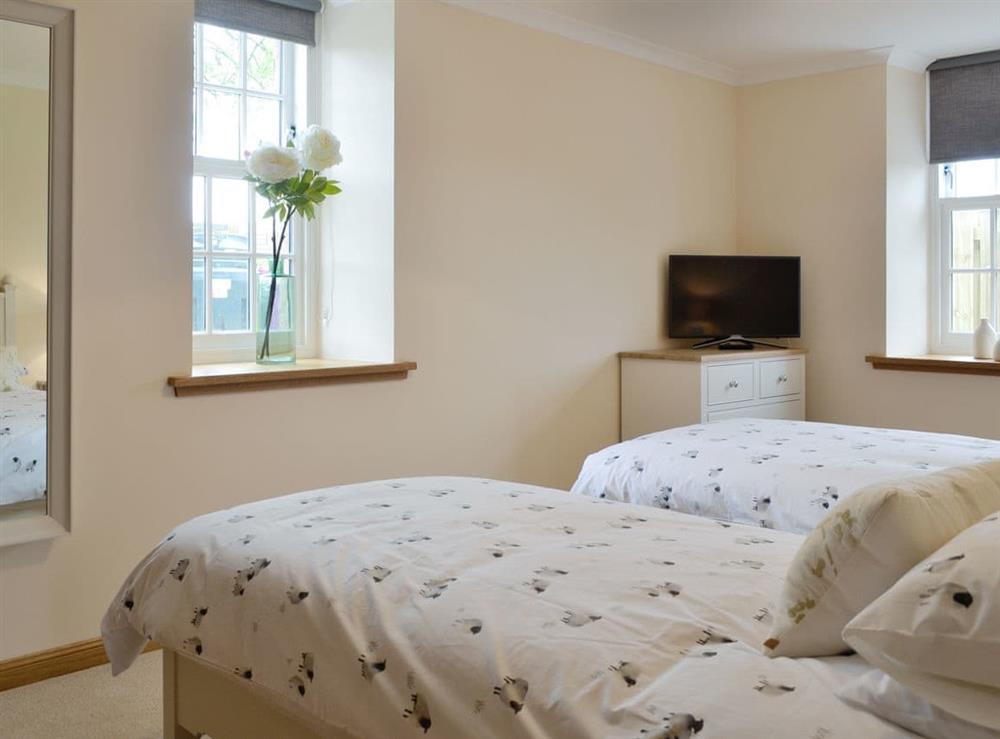 Attractive ground floor twin bedroom at The Stables, 