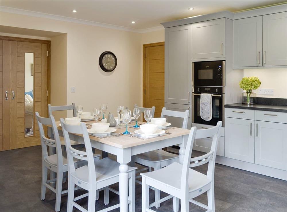 Convenient dining area within kitchen at The Stables, 