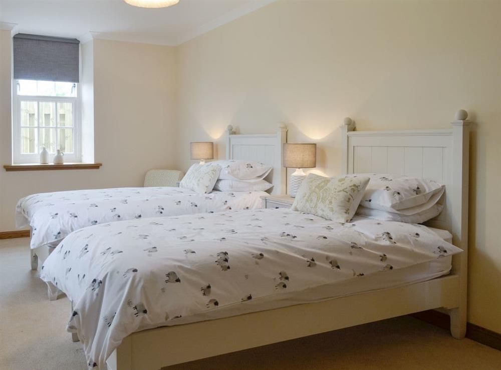 Good-sized ground floor twin bedroom at The Stables, 