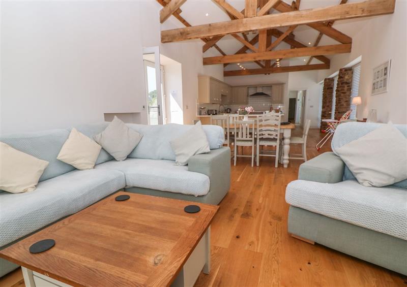 Enjoy the living room at Old Orchard Barn, St Mellion